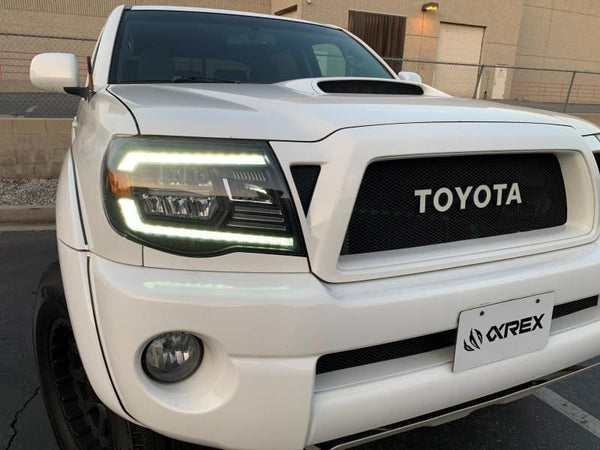 AlphaRex 2005 - 2011 Toyota Tacoma LUXX Crystal Headlights Plank Style Chrome w/Activation Light/DRL