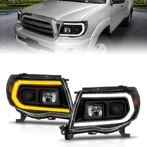 ANZO 2005 - 2011 Toyota Tacoma Projector Headlights w/Light Bar Switchback Black Housing