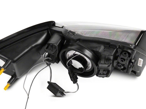 Raxiom 1999 - 2004 Ford Mustang Axial Series Headlights w/ LED Bar- Black Housing (Clear Lens)