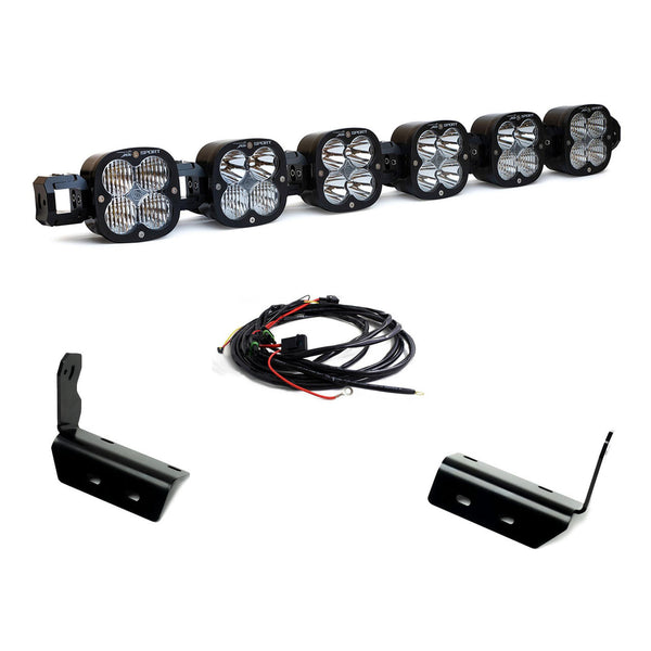 Set of six LED work lights with mounting brackets and wiring on a white background