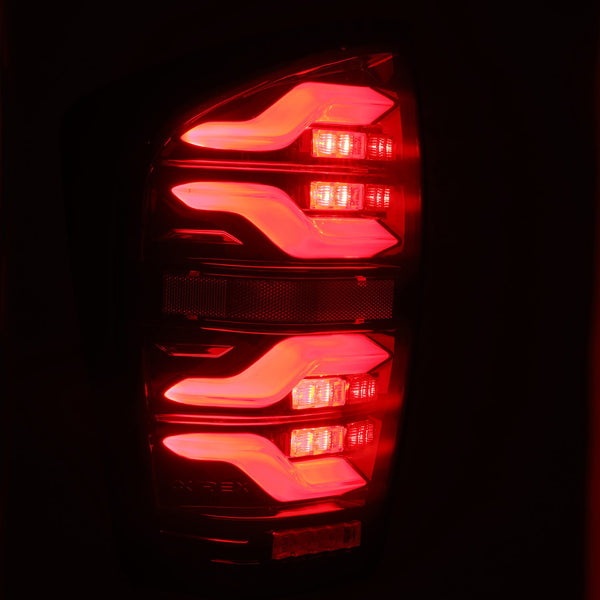 AlphaRex 2016 - 2023 Toyota Tacoma LUXX LED Taillights Blk/Red w/Activ Light/Seq Signal