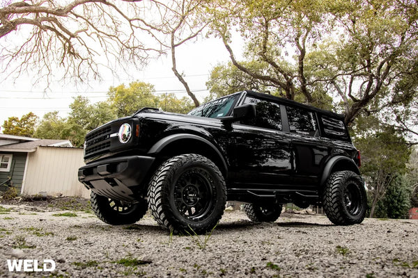 Weld Off-Road W105 17X10 Cinch 6X135 / 6X139.7 ET-25 BS4.50 Satin Black MIL / Gloss Black 106.1