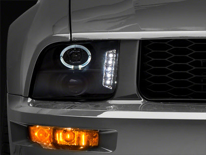 Raxiom 2005 - 2009 Ford Mustang Excluding GT500 LED Halo Projector Headlights- Blk Housing (Clear Lens)