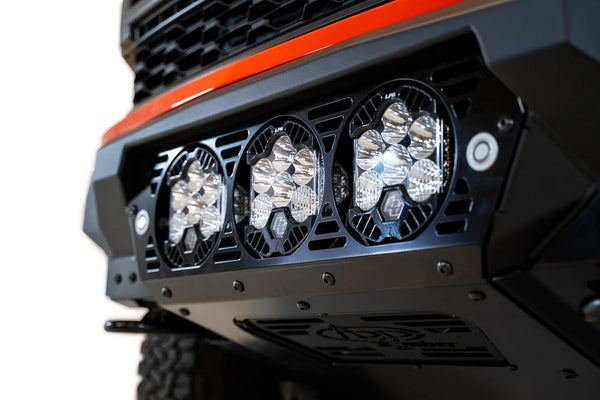 Addictive Desert Designs 2021+ Ford F-150 Raptor Bomber Front Bumper w/ 3 Baja Designs LP6 Light Mounts