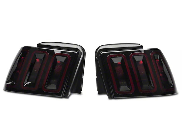 Raxiom 99-04 Ford Mustang Excluding 99-01 Cobra Icon LED Tail Lights- Black Housing (Smoked Lens)
