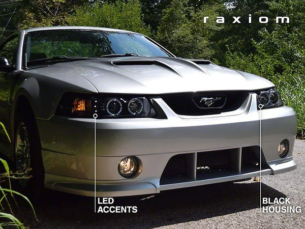 Raxiom 1999 - 2004 Ford Mustang Dual LED Halo Projector Headlights- Black Housing (Clear Lens)