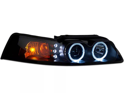 Raxiom 1999 - 2004 Ford Mustang Dual LED Halo Projector Headlights- Black Housing (Smoked Lens)