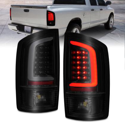 ANZO 2002-2006 Dodge Ram 1500 LED Tail Lights w/ Light Bar Black Housing Smoke Lens - GUMOTORSPORT