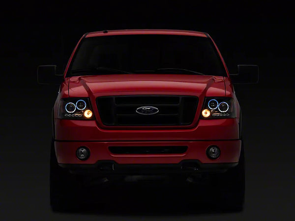 Raxiom 2004 - 2008 Ford F-150 Dual LED Halo Projector Headlights- Black Housing (Clear Lens)