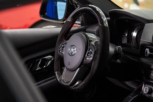 OLM LE Carbon Fiber Steering Wheel Covers (4pc set) - 2020+ GR Supra - GUMOTORSPORT