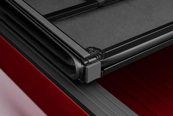 Lund 15-18 Ford F-150 Styleside (5.5ft. Bed) Hard Fold Tonneau Cover - Black - GUMOTORSPORT